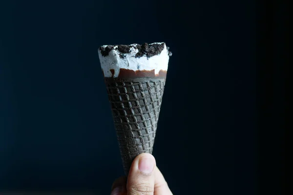 Person Hand Holding Ice Cream Black Background Copy Space — Stock fotografie