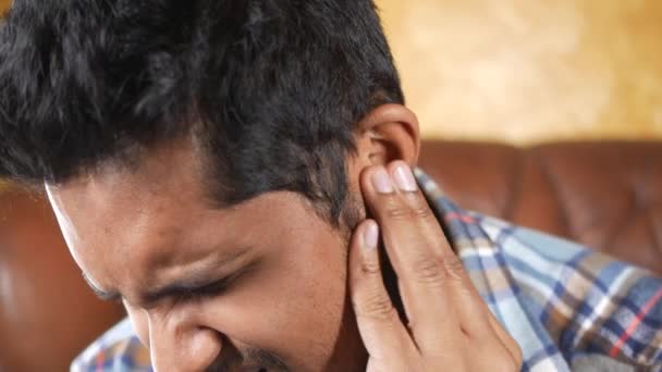 Young Man Having Ear Pain Touching His Painful Ear — Stock Video