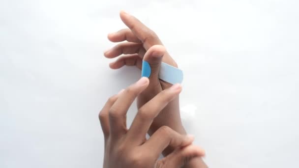 Blue Color Adhesive Bandage Hand — 图库视频影像