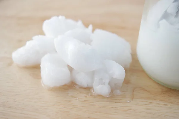 Cold Coconut Oil Table Close — Stok fotoğraf