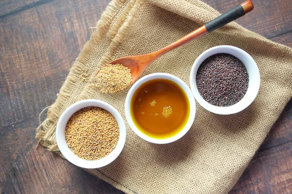 top view of Mustard oil in a jar on table top view ,