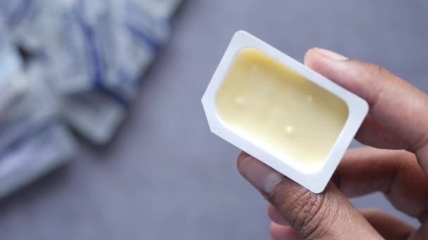 Holding Smart Plastic Butter Container — Vídeo de Stock