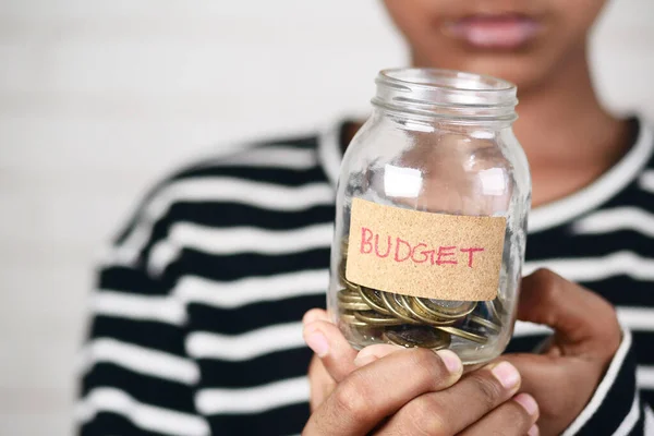 Boy Holding Coin Jar Budget Text — Zdjęcie stockowe