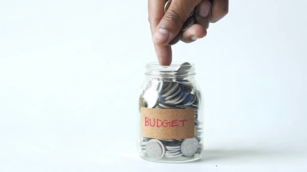 Saving Coins Glass Jar Budget Text — Stockvideo
