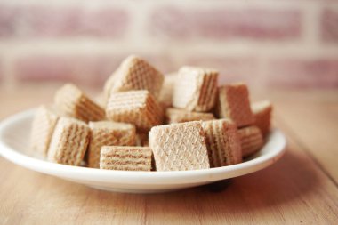 cube share wafer on plate on table ,
