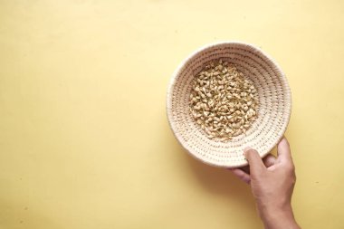 close up of jasmine dry flower in a container on table ,