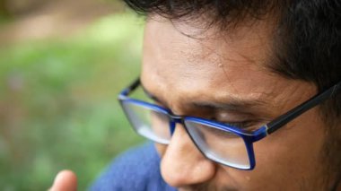 young man sweating on hot weather ,