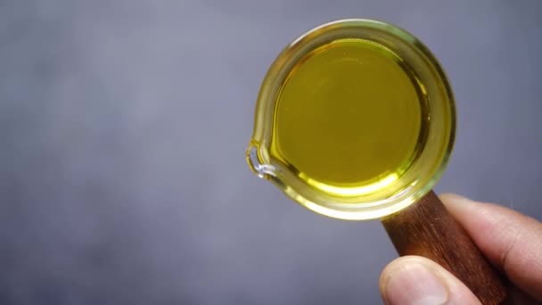 Yellow Sunflower Oil Small Glass Container — Vídeo de stock