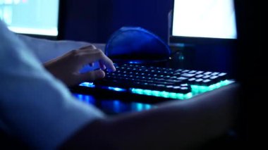  Gamers Hands on a Keyborad Playing Games ,