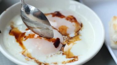 Fried eggs in the plate close up ,,