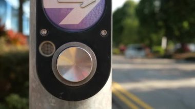 close up of crossing signal button in singapore .