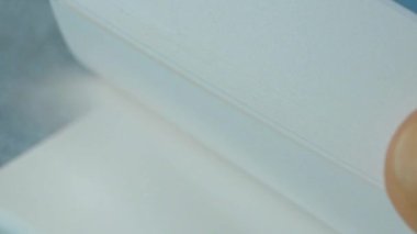  slow motion of turning pages of a diary ,