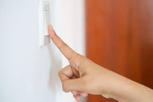 Finger Turning Lighting Switch — Stock Photo, Image