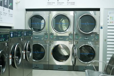 Singapore Orchard 10 June 2022, Row of industrial laundry machines ,