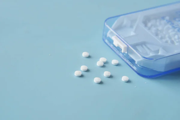 artificial sweetener container on table .