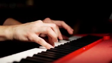 women hands playing grand piano at night ,