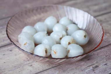 fresh Lychee on table close up .
