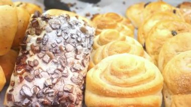  apple raisin bread on chopping board on table ,