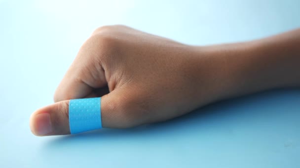 Blue Color Adhesive Bandage Hand — Vídeo de stock