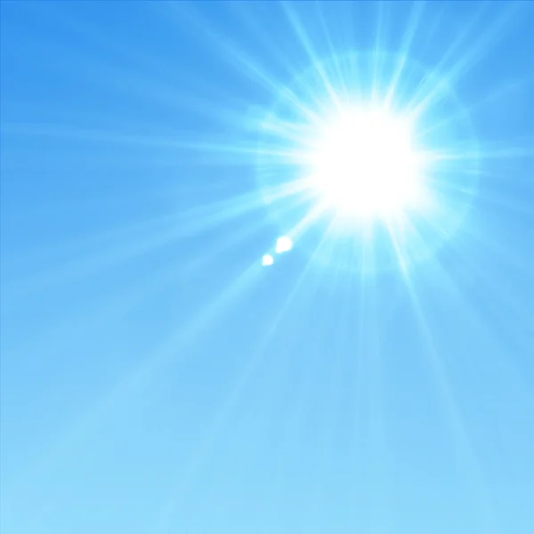 Блакитне небо з блискучим сонцем — стокове фото