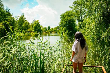 Tourist enjoy views of lake in Kolkheti national park. Travel sightseeing destination around Batumi in Georgia Kolkheti national park. Famous sightseeing destination in Georgia