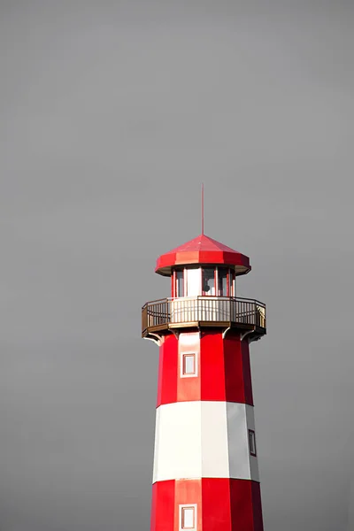 Red Lighthouse Sun Light Grey Sky High Contrast Stormy Clouds — Stock Photo, Image