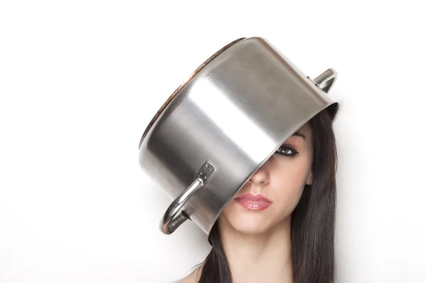 Girl wearing a pot as hat — ストック写真