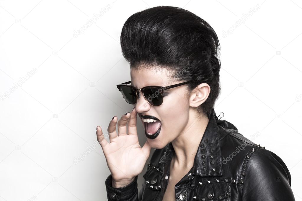 Rock girl wearing sunglasses half profile