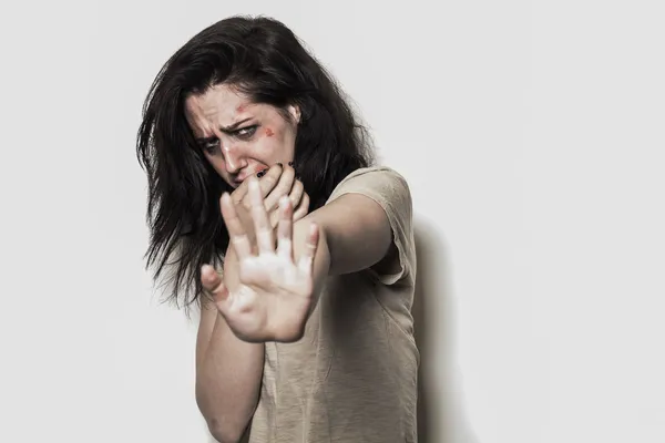 Beaten up girl asking to stop — Stock Photo, Image