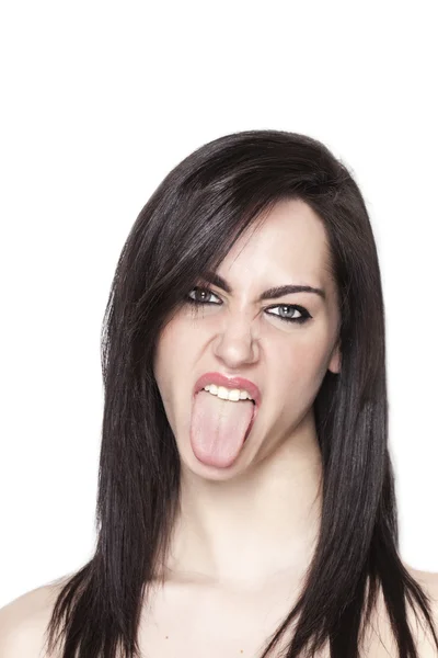 Girl with tongue stuck out — Stock Photo, Image