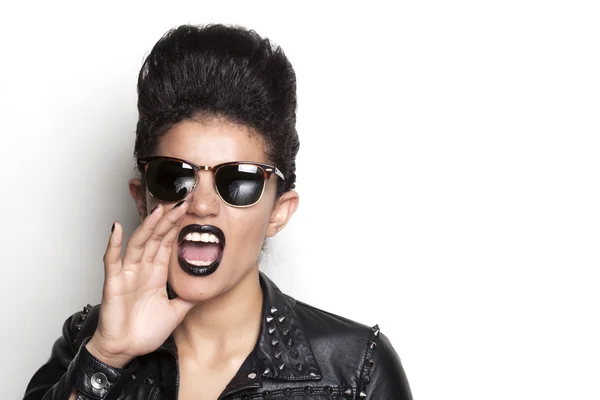 Screaming woman wearing sunglasses and leather jacket — Stock Photo, Image