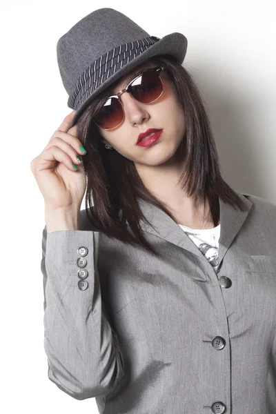 Gangster woman wearing a hat and looking Royalty Free Stock Photos