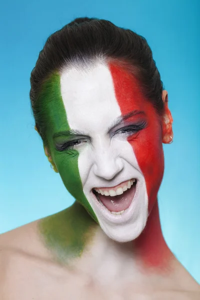 Cheerful italian supporter for FIFA 2014 looking — Stock Photo, Image