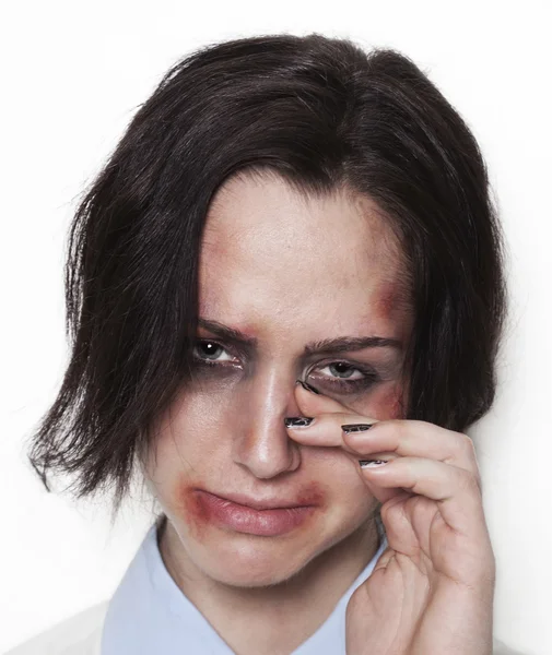 Beaten up girl looking and crying — Stock Photo, Image