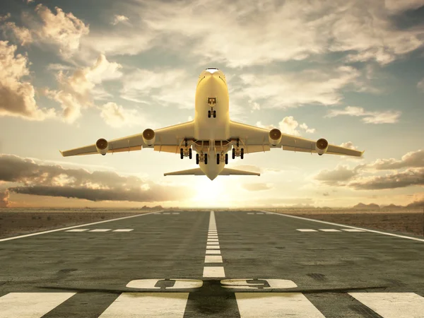 Avión despegando al atardecer — Foto de Stock