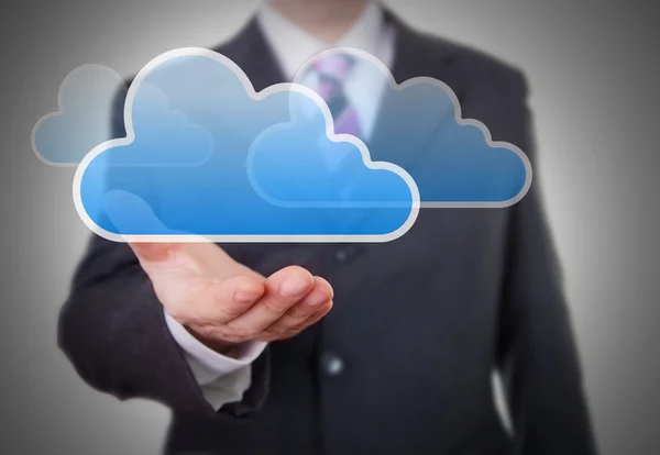Un om de afaceri arată un Cloud — Fotografie, imagine de stoc