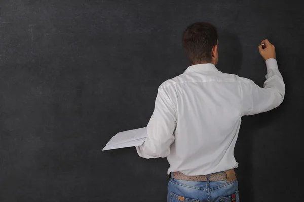 Teacher at the blackboard — Stock Photo, Image