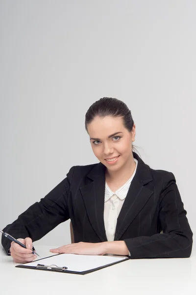 Emotionele zakelijke dame met documenten — Stockfoto