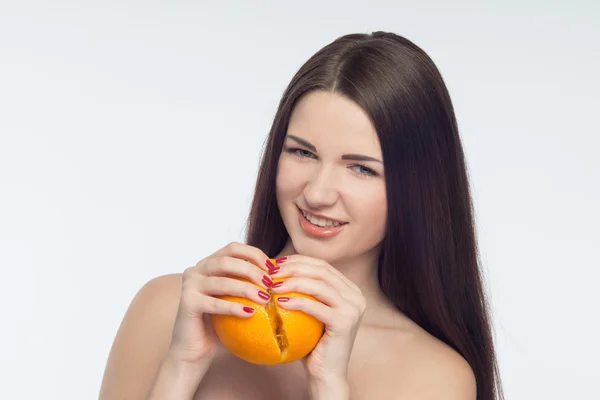 Girl and orange — Stock Photo, Image