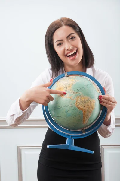 Business woman with the globe — Stock Photo, Image