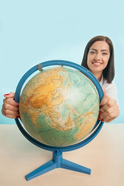 stock image Business woman with the globe