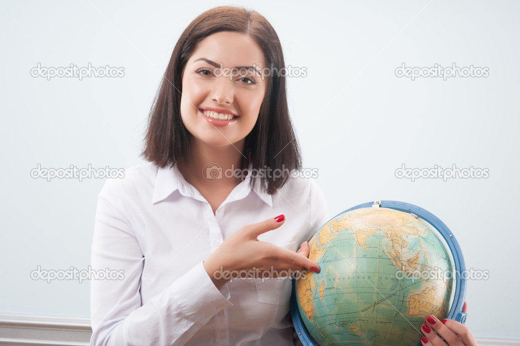 Business woman with the globe
