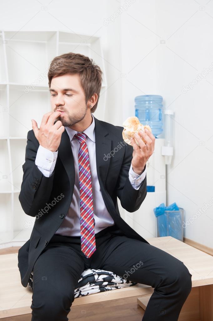 man having a snack