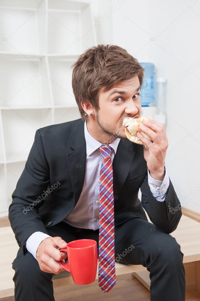 man having a snack