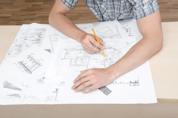 Two young architectures working at projective drawing — Stock Photo, Image