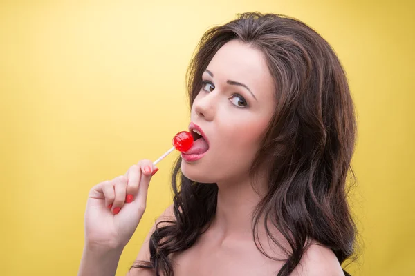 Sexy woman with sweets — Stock Photo, Image