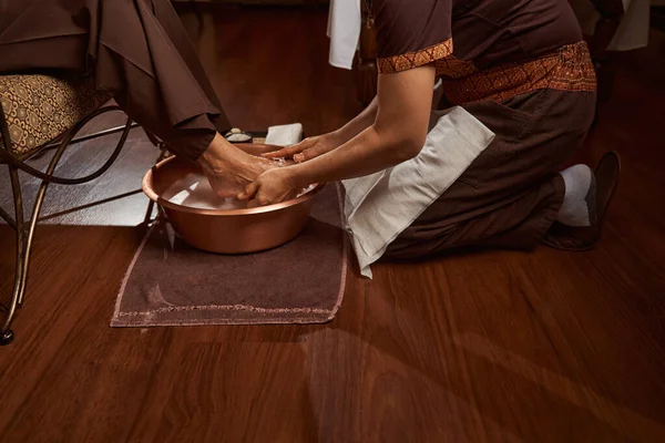 Female client receiving a Thai foot massage — Stock Photo, Image