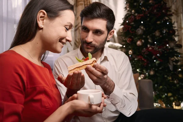 Happy woman going to eat dessert on New Year eve — Stock Photo, Image