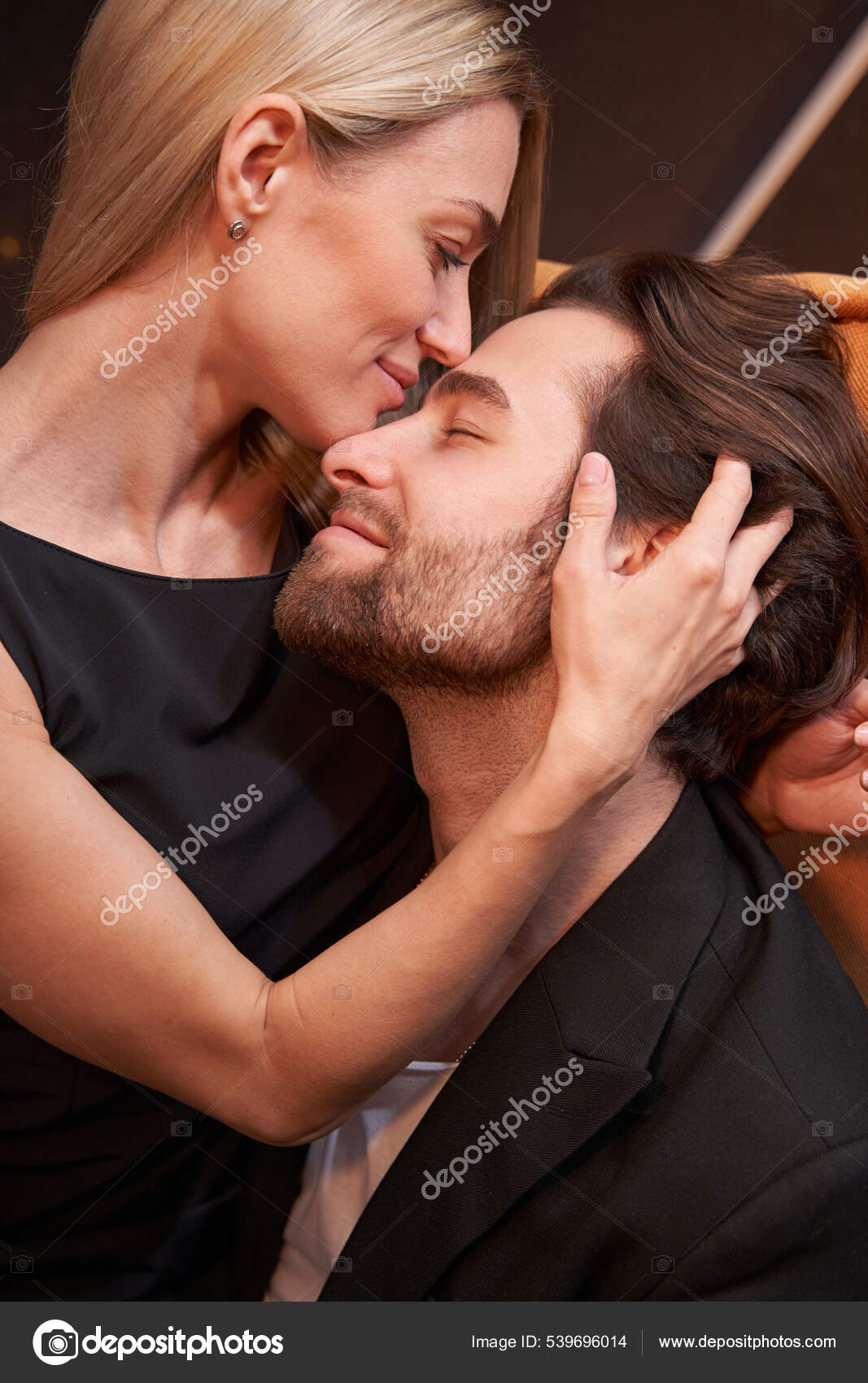 Male enjoying kiss on forehead from his girlfriend — Stock Photo ©  yacobchuk1 #539696014, image size:1067x1700