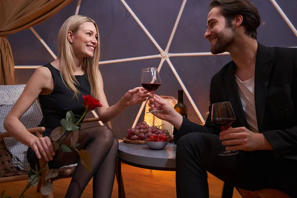 Female taking glass of wine from her romantic partner — Zdjęcie stockowe